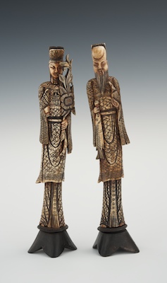 A Pair of Bone Carved Figures