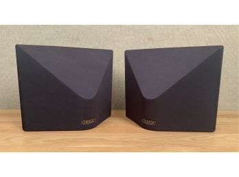 A pair of bookshelf speakers,