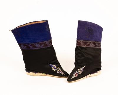 A pair of bound boots, circa