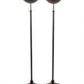 A Pair of Brass and Copper Tor