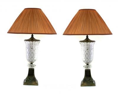 A pair of brass and cut-glass table