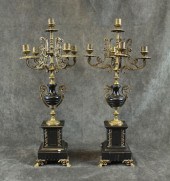 A PAIR OF BRASS AND BLACK MARB