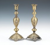 A Pair of Brass Candlesticks P