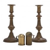 A Pair of Brass Candlesticks a