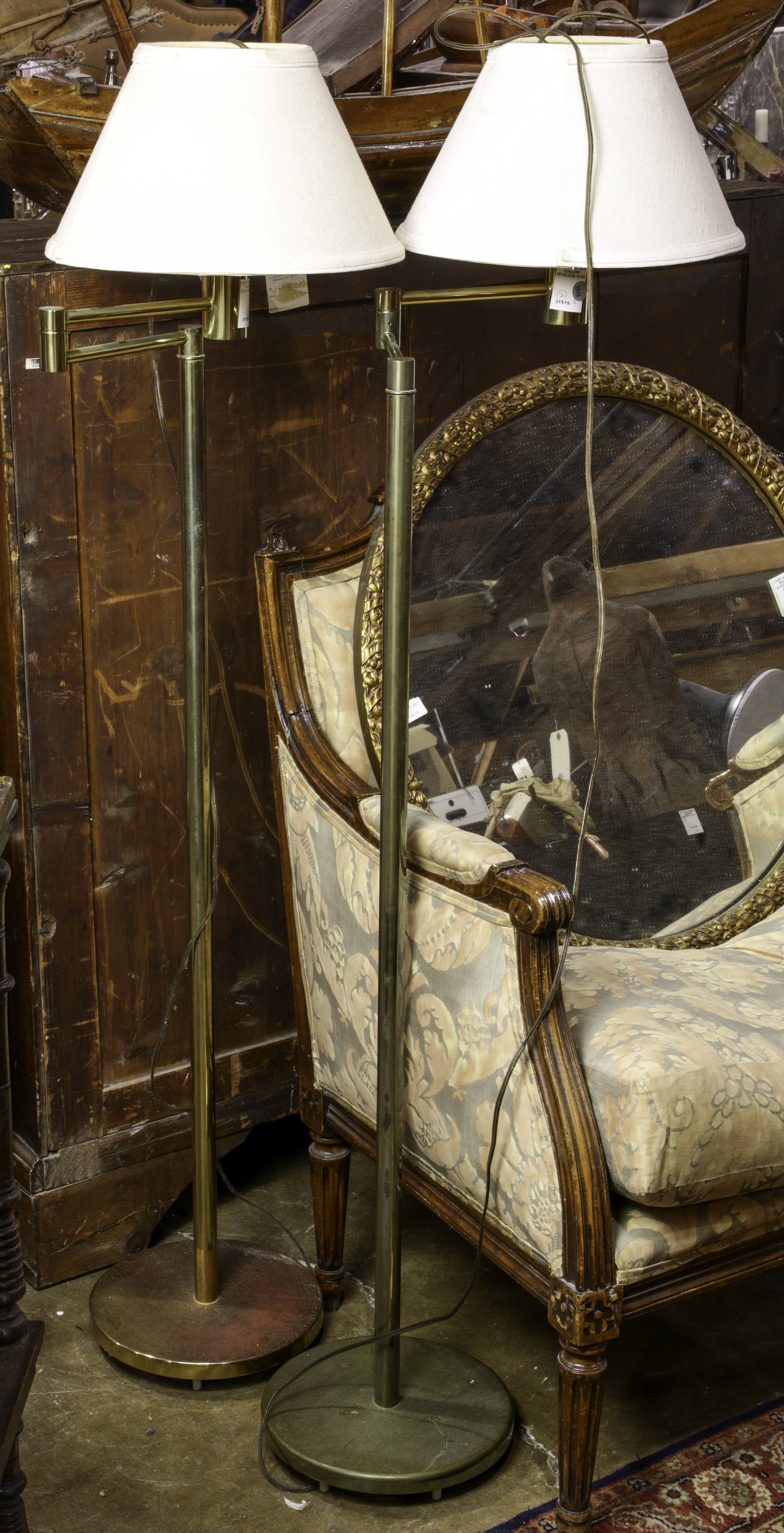A PAIR OF BRASS FLOOR LAMPS A