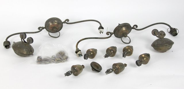 A pair of brass two-branch