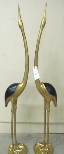 A PAIR OF BRASS WILDLIFE SCULPTURES