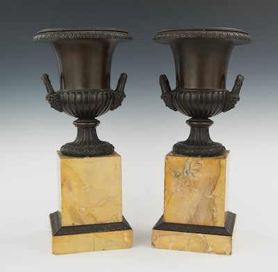 A Pair of Bronze and Marble Urns