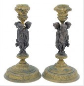 A PAIR OF BRONZE AND GILT BRON