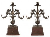 A PAIR OF BRONZE CANDELABRAS,