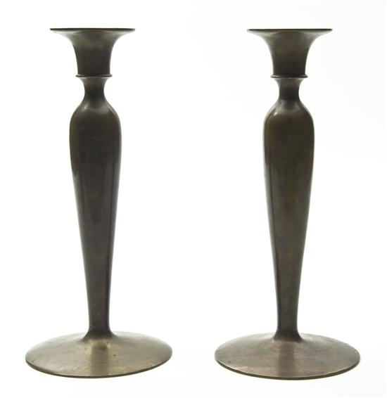 A Pair of Bronze Candlesticks