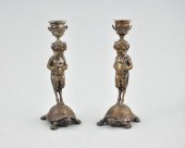 A Pair of Bronze Candlesticks