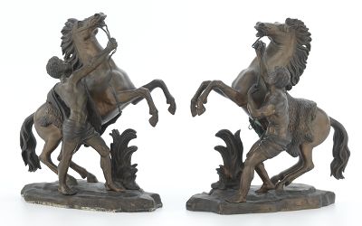 A Pair of Bronze Figurals after
