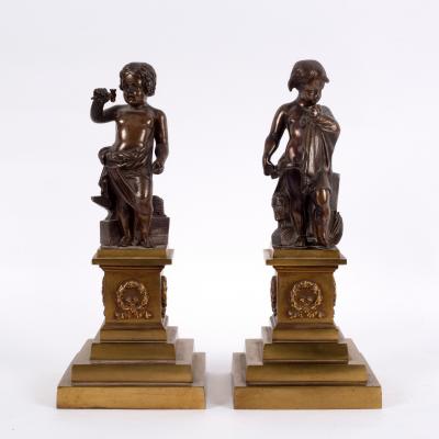 A pair of bronze figures of
