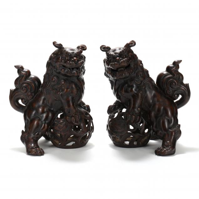 A PAIR OF BRONZE FOO LIONS OR