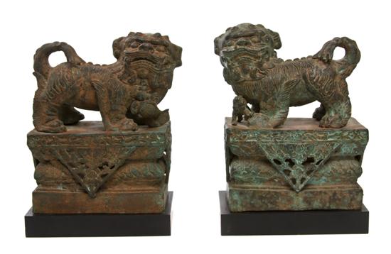 A Pair of Bronze Fu Dogs the