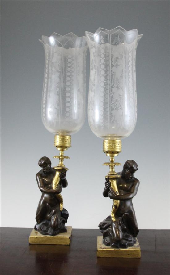 A pair of bronze glazed and gilt