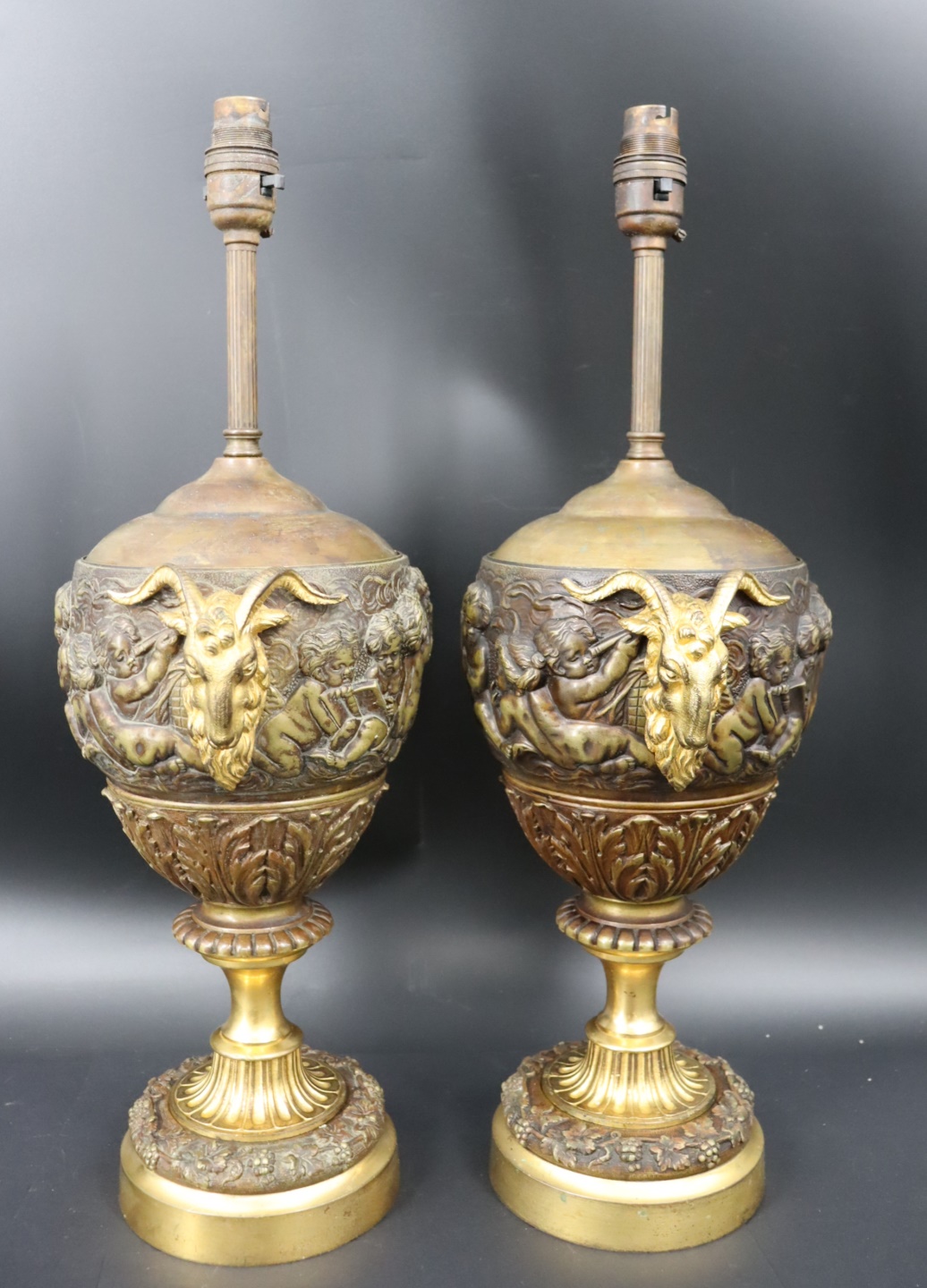 A PAIR OF BRONZE LAMPS WITH