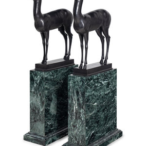 A Pair of Bronze Models of