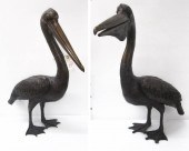 A PAIR OF BRONZE PELICANS, MAL