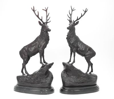 A Pair of Bronze Stags After