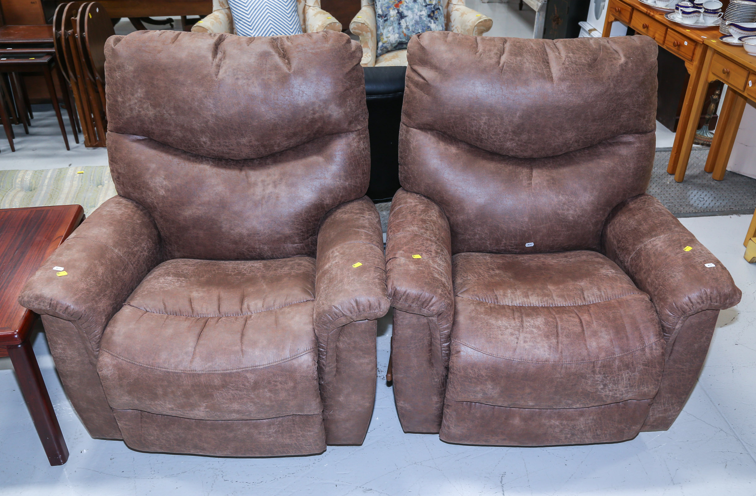 A PAIR OF BRUSHED LEATHER LOUNGE