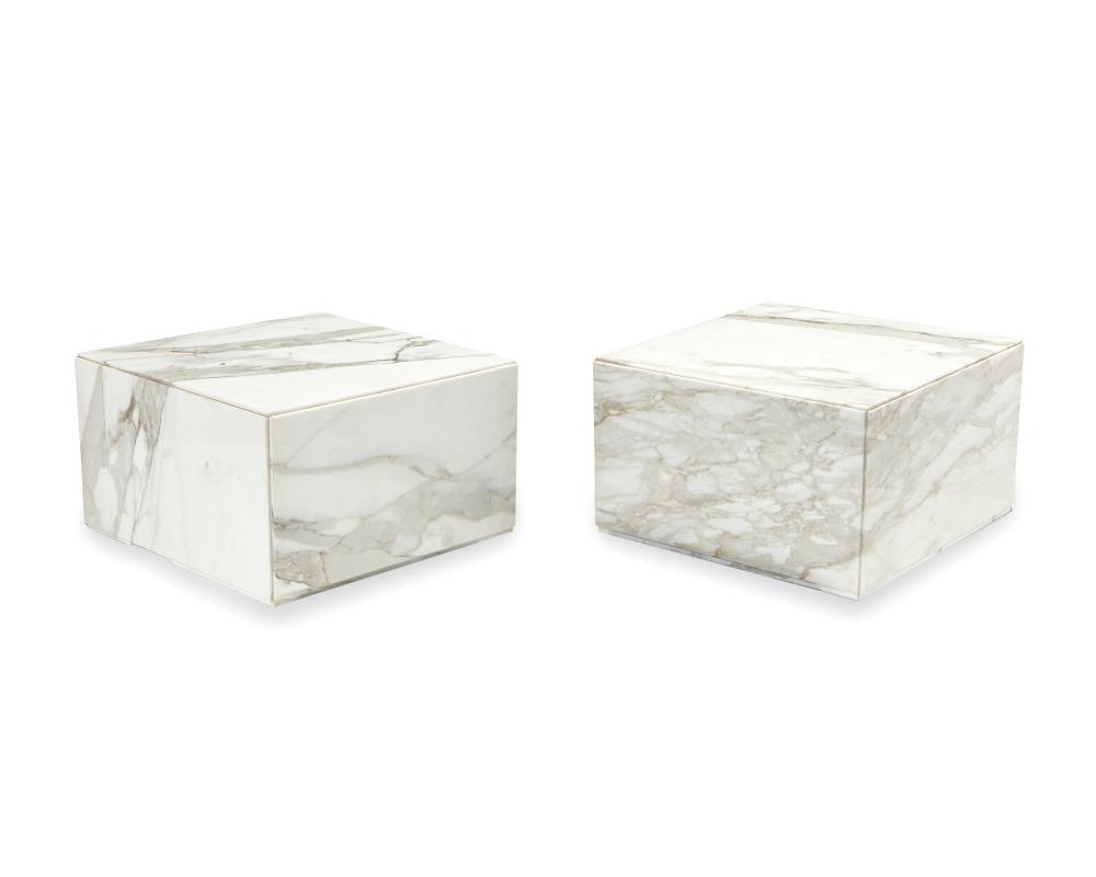 A PAIR OF CARRERA MARBLE PLINTH