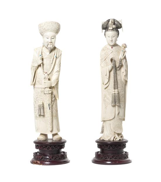 * A Pair of Carved Ivory Models