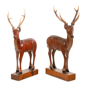 A Pair of Carved Fruitwood and