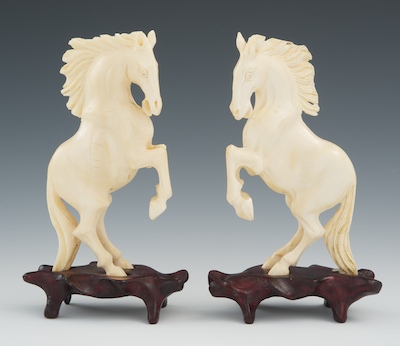 A Pair of Carved Ivory or Bone