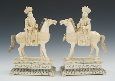 A Pair of Carved Ivory Equestrian
