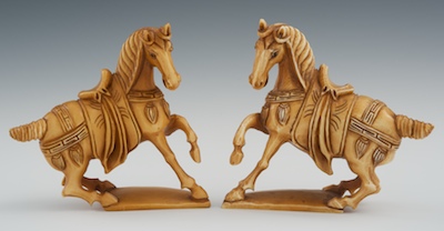 A Pair of Carved Ivory or Bone