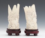 A Pair of Carved Ivory Scenic