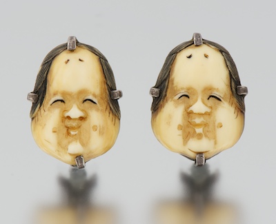 A Pair of Carved Ivory Ear Clips