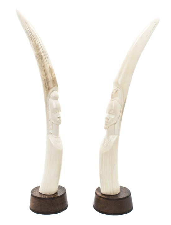 A Pair of Carved Ivory African