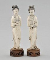 A Pair of Carved Ivory Figurin