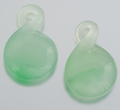 A Pair of Carved Jadeite Pendants