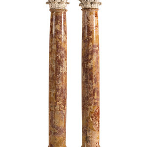 A Pair of Carved Limestone Capitals