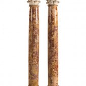 A Pair of Carved Limestone Cap