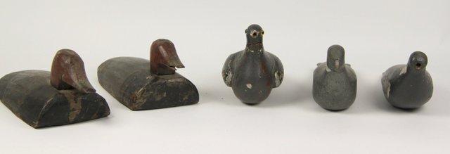 A pair of carved painted duck