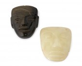 A PAIR OF CARVED STONE MASK OR