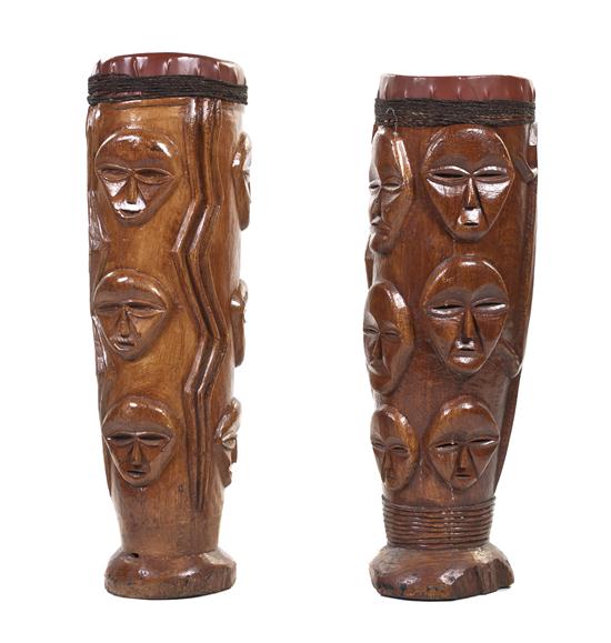A Pair of Carved Wood Tiki Drums