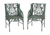 * A Pair of Cast Iron Chairs R