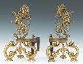A Pair of Cast Brass Andirons