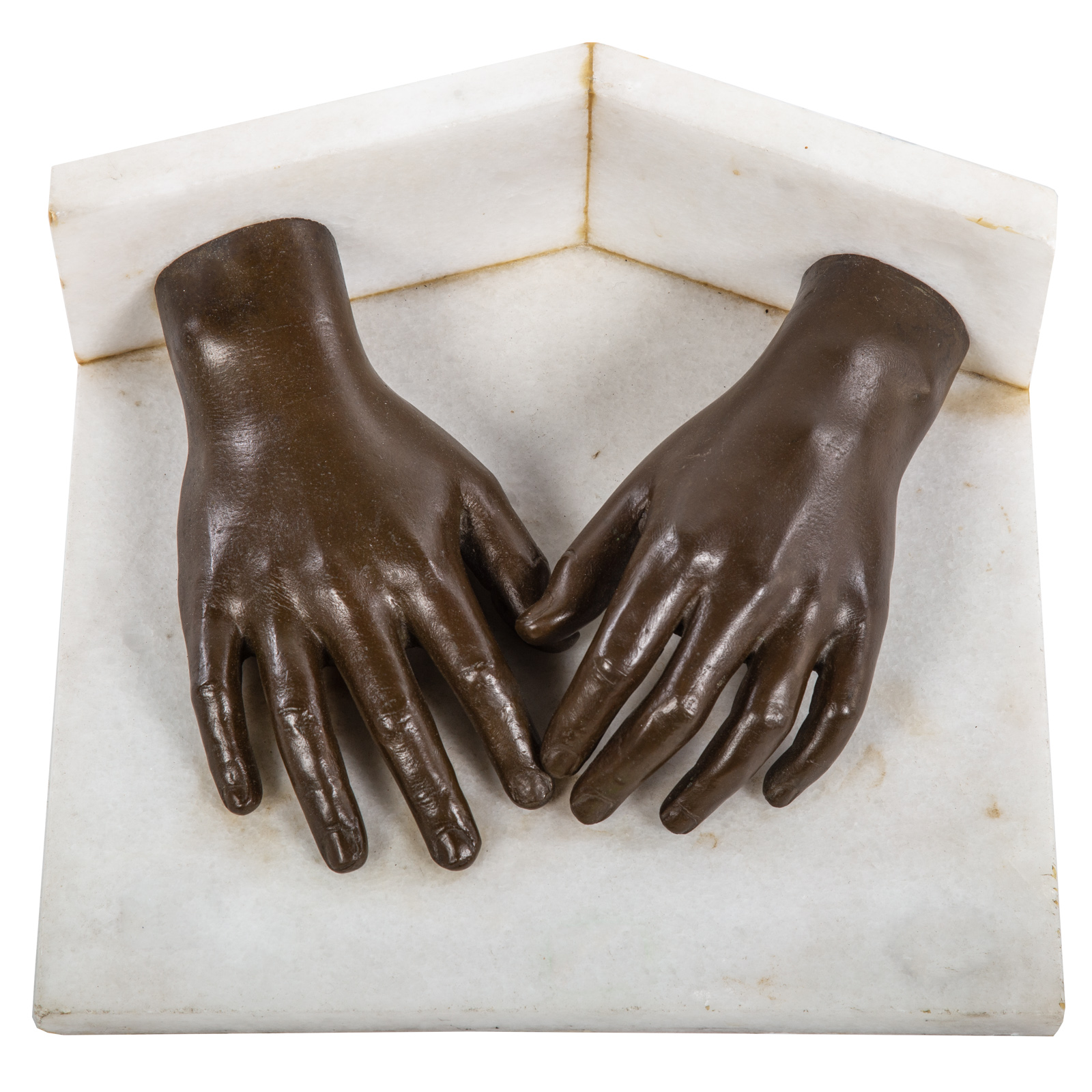 A PAIR OF CAST BRONZE HANDS IN