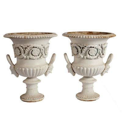 A pair of cast iron campana