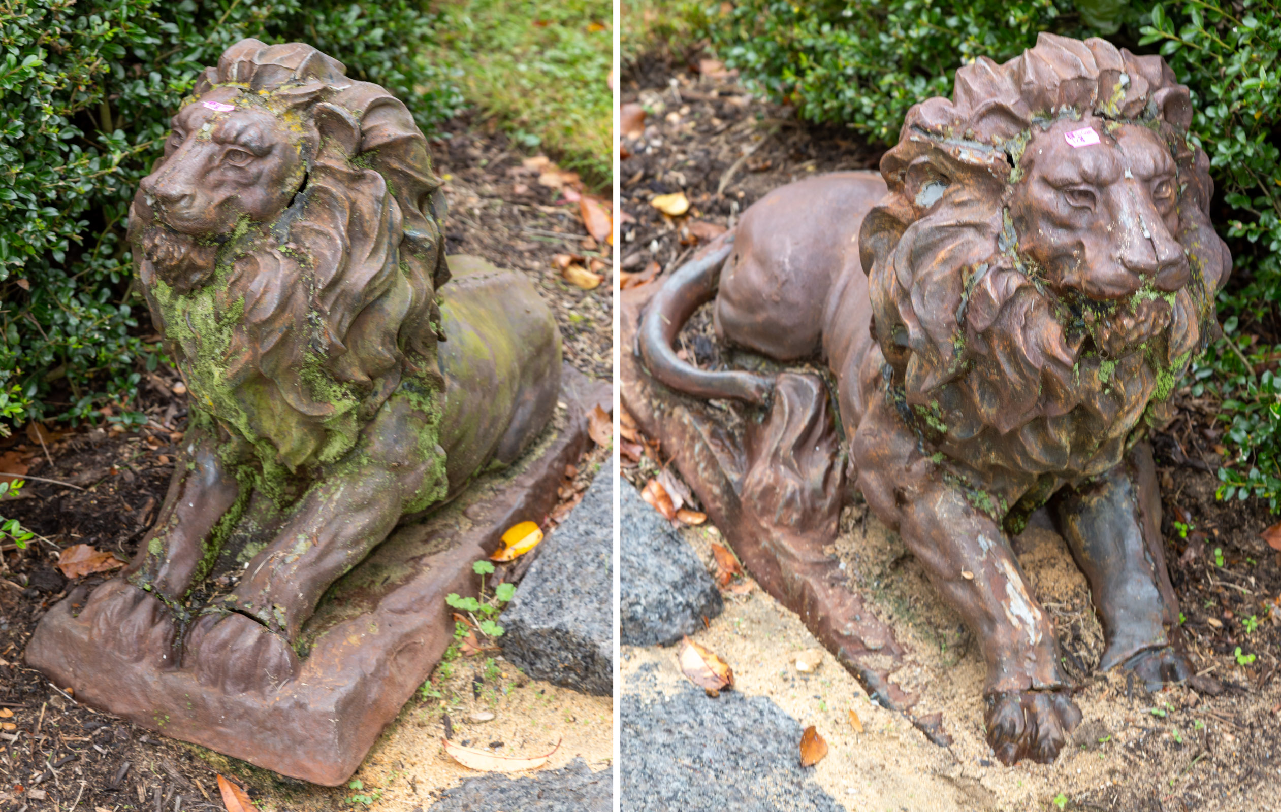 A PAIR OF CAST IRON FIGURAL LION