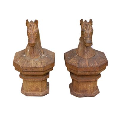 A pair of cast iron horse head gate