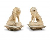 A PAIR OF CAST STONE LION GARN