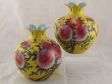 A pair of ceramic vases in the
